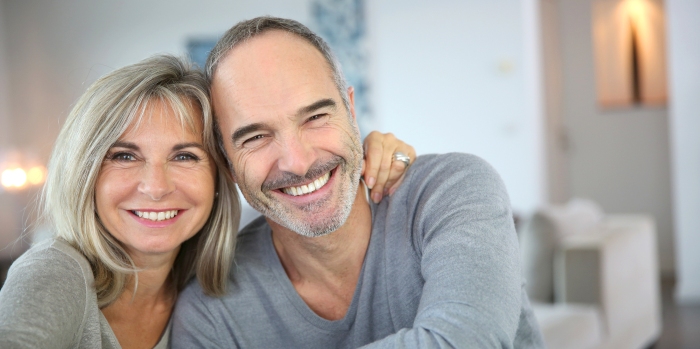 husband and wife enjoy healthy smiles